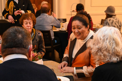 Dame Cindy meeting guests for the celebratory high tea