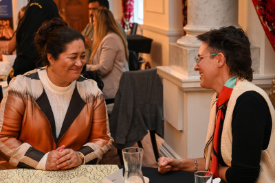 Dame Cindy with one of the guests for the celebratory high tea