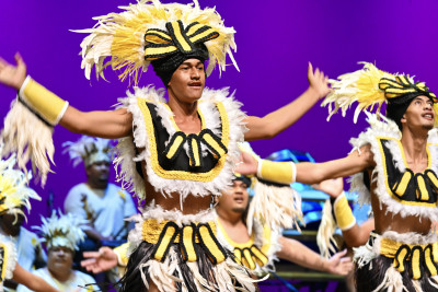 Performers in traditional headdress