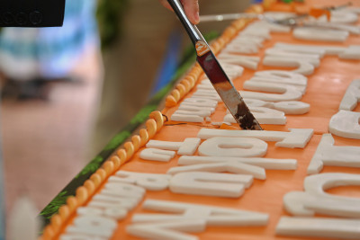 The 60th birthday cake being cut