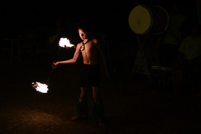 A young fire dancer