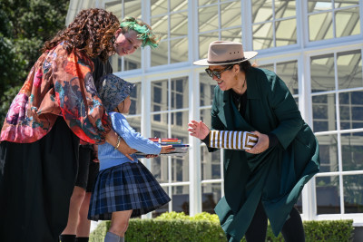 Dame Cindy presents a gift to children from Mt Cook School