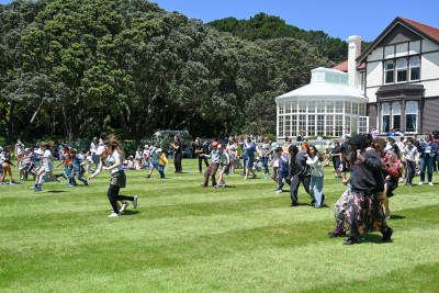 Mt Cook School children take part in a three-legged race on the lawn at Government House
