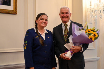 Girls' Brigade member Jessica Carey presents Dr Davies with flowers