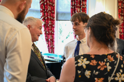 Dr Davies speaks with members of the Boys' Brigade
