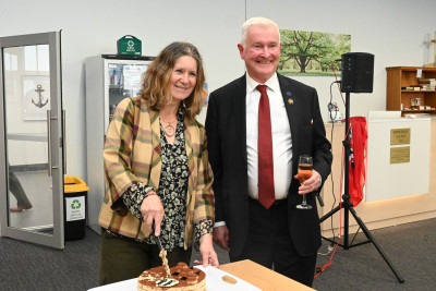 Sharyn Forsyth, of Maritime New Zealand, cutting the celebratory cake