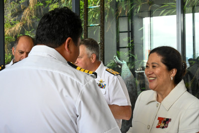 Dame Cindy speaks with a member of the Royal New Zealand Navy