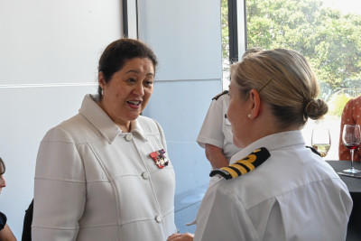 Dame Cindy speaks with a member of the Royal New Zealand Navy