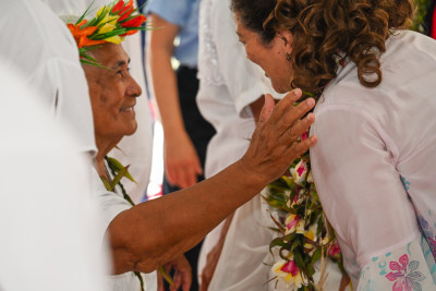 Dame Cindy greeted by a member of the Fatupaepae