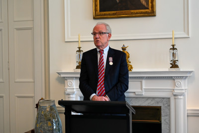 Greg O'Connor, MP and member of the wing, speaks at the reunion