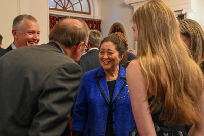 Dame Cindy speaks with guests at the Life Flight reception