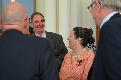 Dame Cindy speaks with guests
