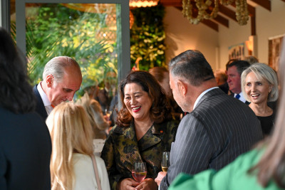 Dame Cindy speaks with guests