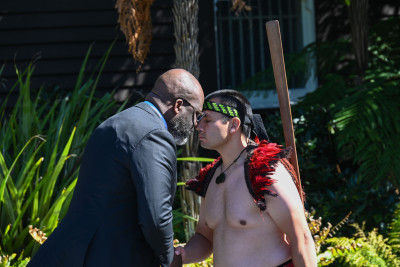 HE Mr António Luvualu de Carvalho, Ambassador of the Republic of Angola, is greeted with a hongi