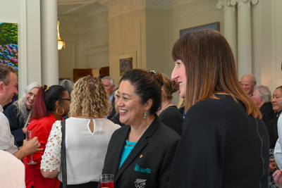 Dame Cindy speaks with guests