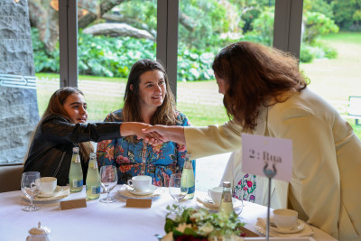 Dame Cindy meeting the family of recipients