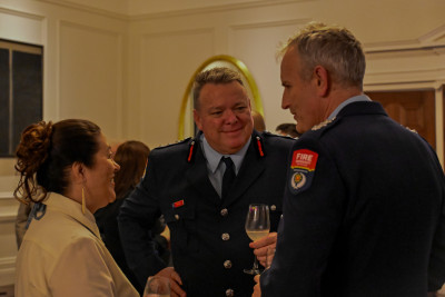 Dame Cindy speaks with Fire and Emergency personnel