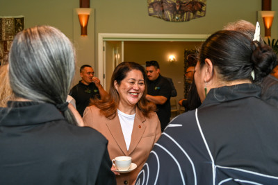 Dame Cindy speaks with guests