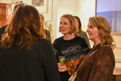 Dame Cindy speaks with guests