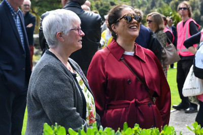 Dame Cindy and Dr Carol West admire the foliage