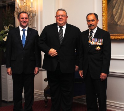 The Governor-General and Rt Hon John Key greet Hon Gerry Brownlee upon entrance.