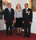 The Governor-General and Rt Hon John Key greet Hon Judith Collins upon entrance.