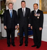 The Governor-General and Rt Hon John Key greet Chris Tremain upon entrance.