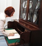 Hon Julia Gillard signs the Visitor's Book at Government House Wellington.