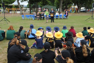 Sir Anand and Lady Susan speak to the gathering of Carterton Children.
