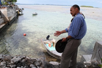 The Governor-General inspects a seawall on the atoll.