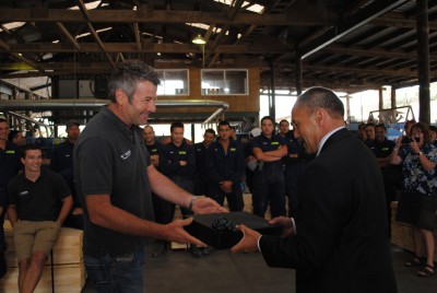 The Managing Director of Mt Pokaka Timber Products Sawmill, Mark Hewitt, presents a gift to Sir Jerry Mateparae.