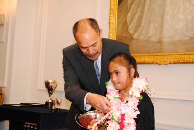 Vanya Hope Reedy receives her award for the 8 -16 years category from the Governor-General.