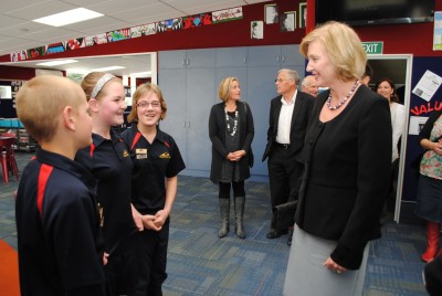 Lady Janine is shown around the Navigator Centre by senior students.